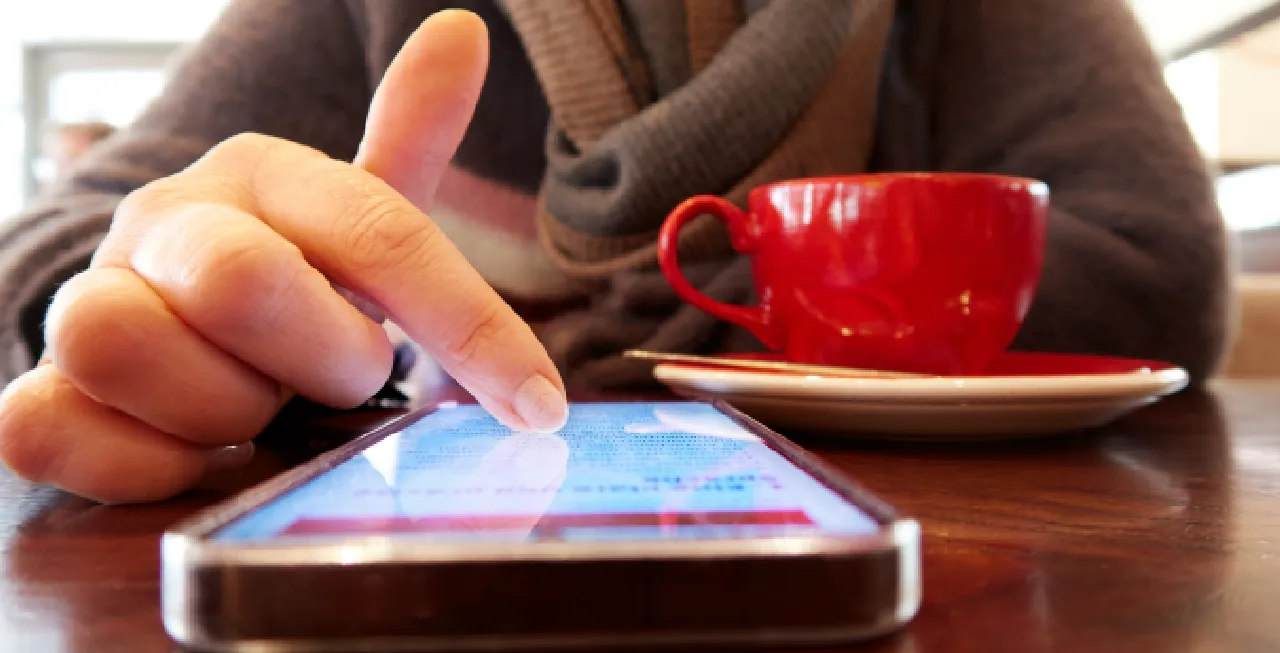 person scrolling on their phone representing How engineering influences everyday life